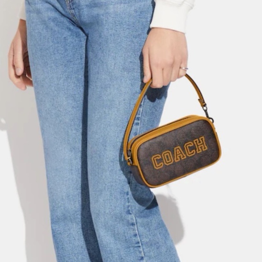 Coach JAMIE WRISTLET IN SIGNATURE CANVAS WITH VARSITY MOTIF New